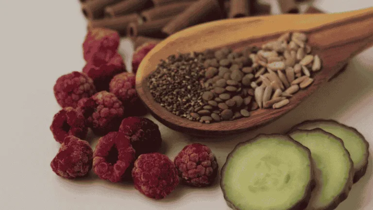 Bowls of berries, whole grains and seeds viewed from above